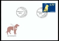 Foto: Ersttagsbrief zur ersten luxemburgischen Briefmarke mit einem Blindenführhund