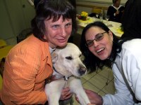 Photo: Le chien guide Urak, Josiane Rommes et Martine Konsbruck sont heureux  cause du chque gnreux